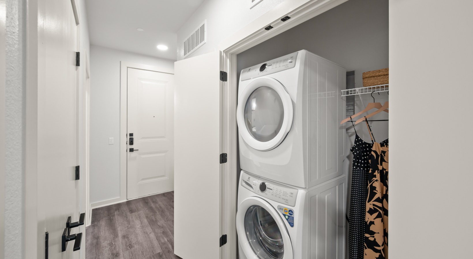 laundry room 1 bedroom model laundry room with stacked full size washer and dryer