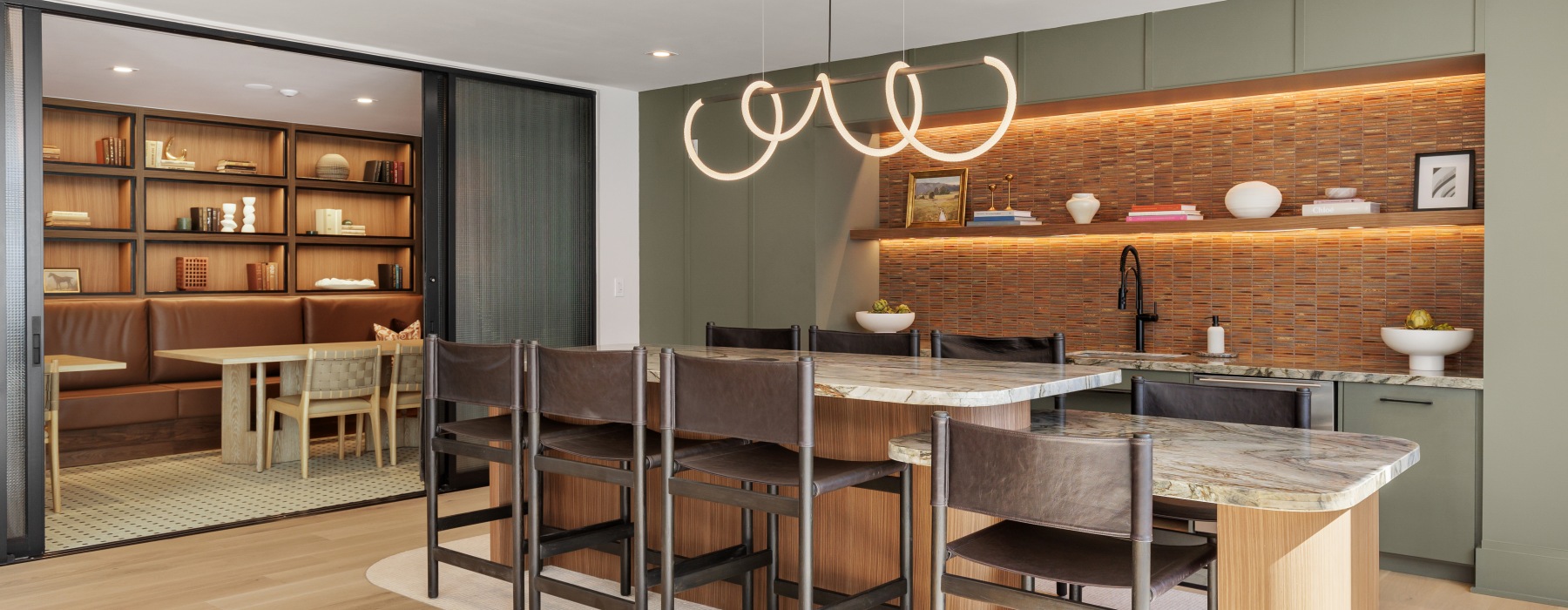 Clubhouse kitchen with speak easy booth