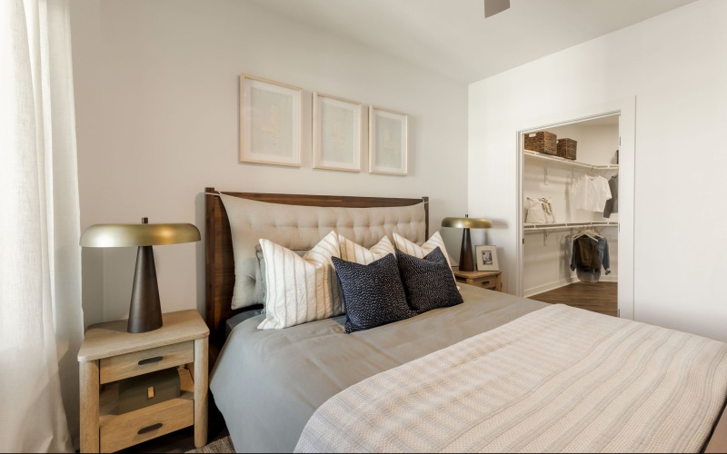 bedroom with king sized bed and large closet