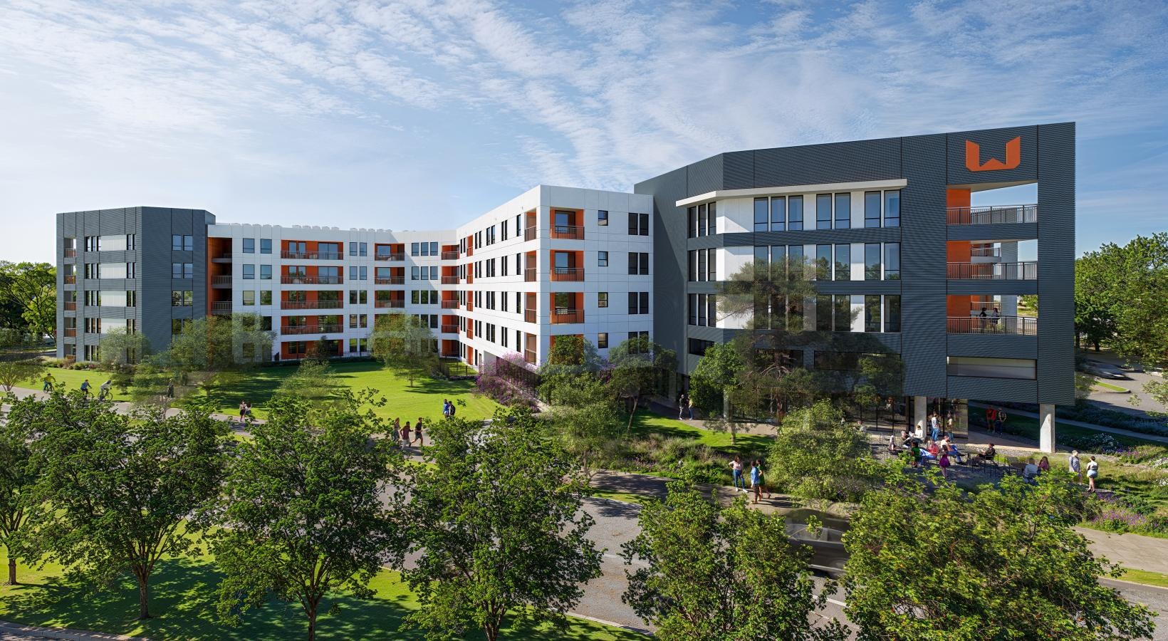 Close to the center of everything a group of people outside of a building